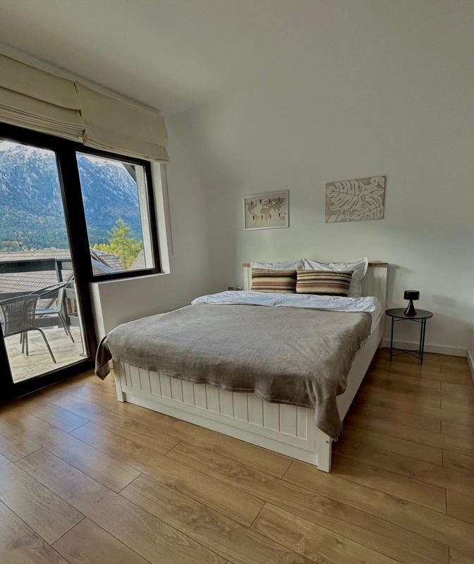 Dormitor cu vedere la munte